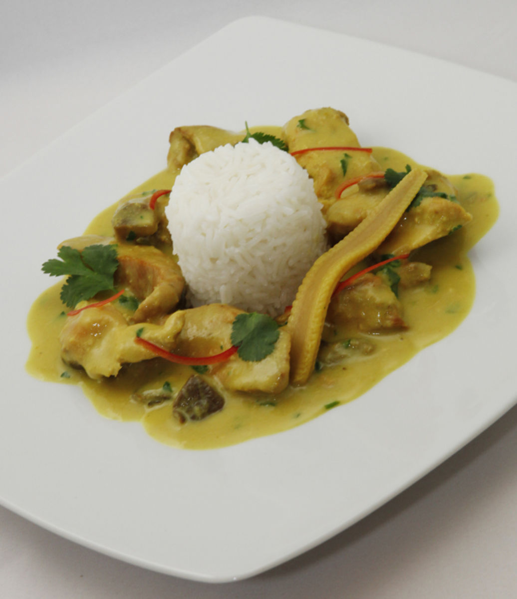 Green curry of chicken fillet with coconut milk