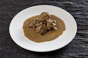 Shoulder of lamb with sweet spices and coconut milk