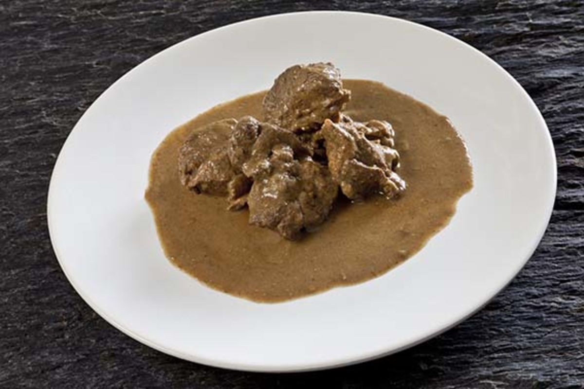 Shoulder of lamb with sweet spices and coconut milk